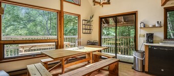 Northeast Passage Chalet is a cozy and warm. Wonderful hot tub on the deck and a great big stone fireplace.