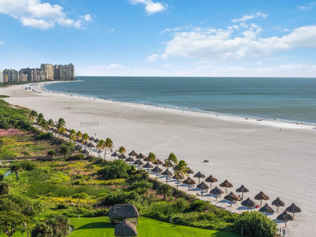 On the beach, sun loungers, beach towels
