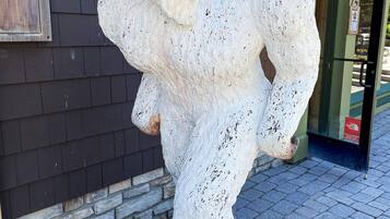 A statue of a bear on a pedestal.