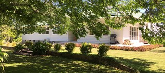 Large country homestead with tennis court and pool. Only 5 mins from the beach.