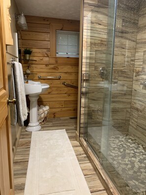 Combined shower/tub, hair dryer, towels, soap