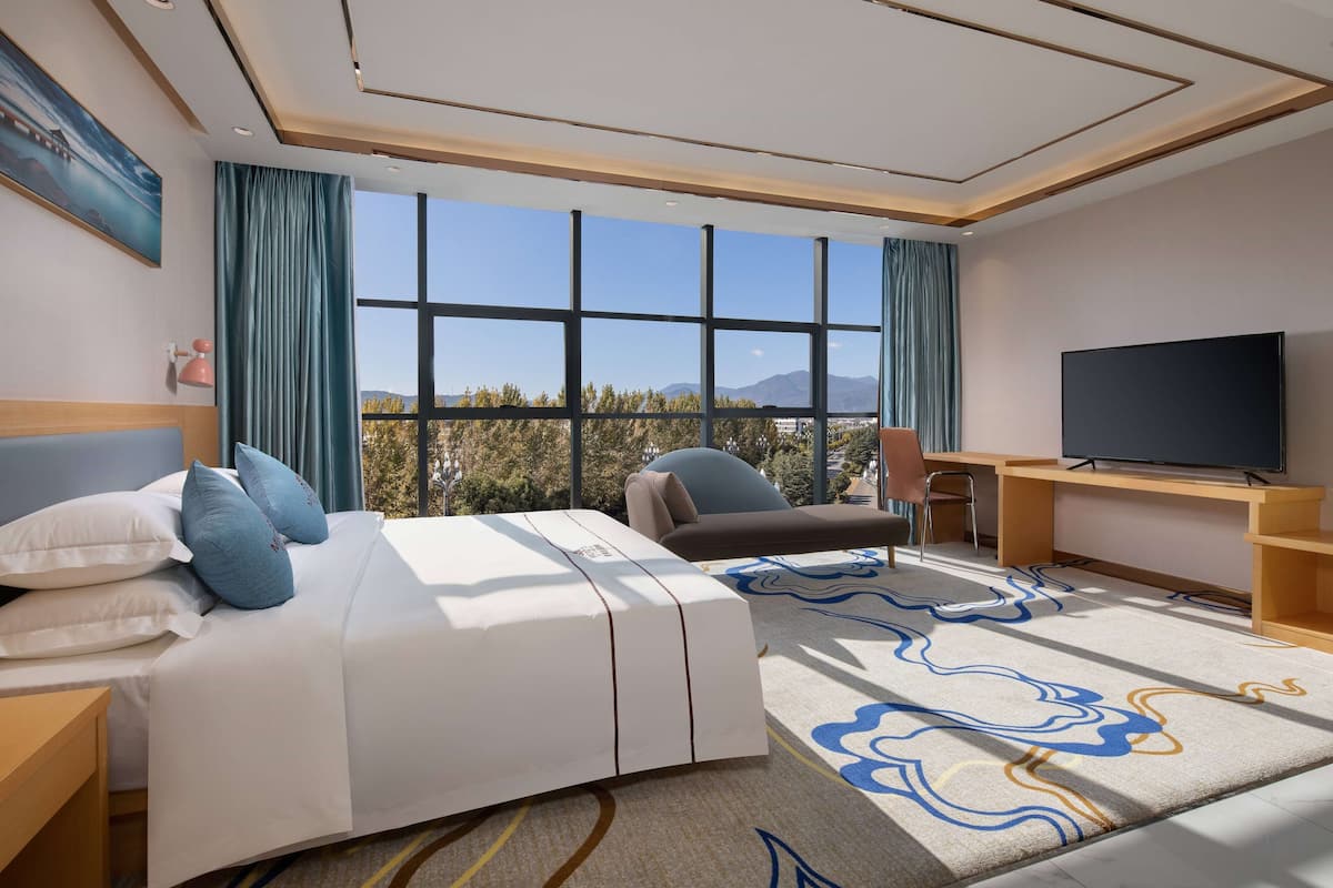 Habitación Confort, 1 cama King size, para no fumadores | Minibar, tabla de planchar con plancha, wifi gratis y ropa de cama