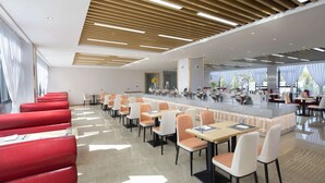 A modern dining area with red seating, a central bar, and large windows. - Microtel by Wyndham Lijiang (Lijiang)