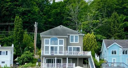 Relax lakeside at our spacious Geneseo house on Conesus Lake