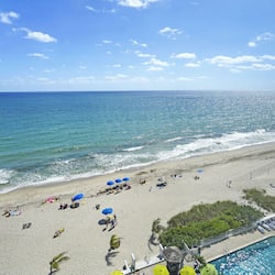On the beach, sun-loungers, beach towels