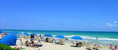 On the beach, sun loungers, beach towels