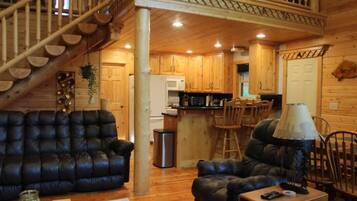 TV connectée, cheminée, lecteur de DVD, baby-foot