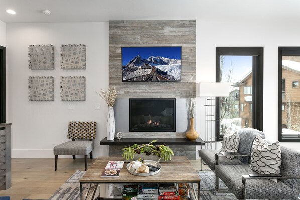 Luxury Condo | Living area | 50-inch TV with cable channels, fireplace, Netflix
