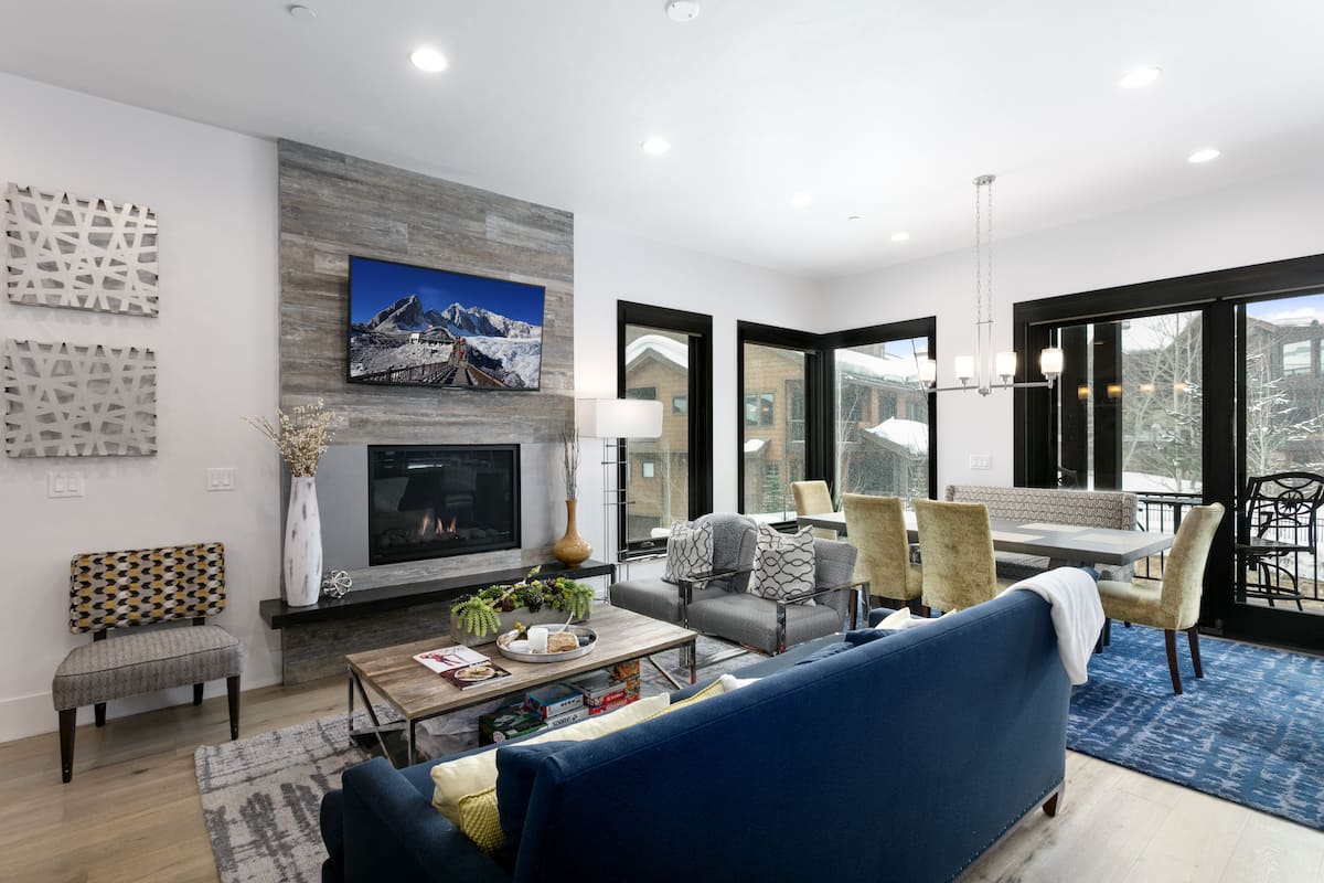 Luxury Condo | Living area | 50-inch TV with cable channels, fireplace, Netflix