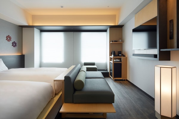 Habitación panorámica con 2 camas individuales (Corner Deluxe Twin room) | Caja de seguridad en la habitación, wifi gratis y ropa de cama