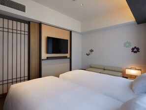 Kamar Twin Deluks, akses difabel, sudut | Brankas, Wi-Fi gratis, dan seprai linen