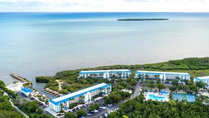 A resort with multiple buildings, a marina, and a large pool area. - 2BR - Key Largo Sunshine Getaway (Tavernier)