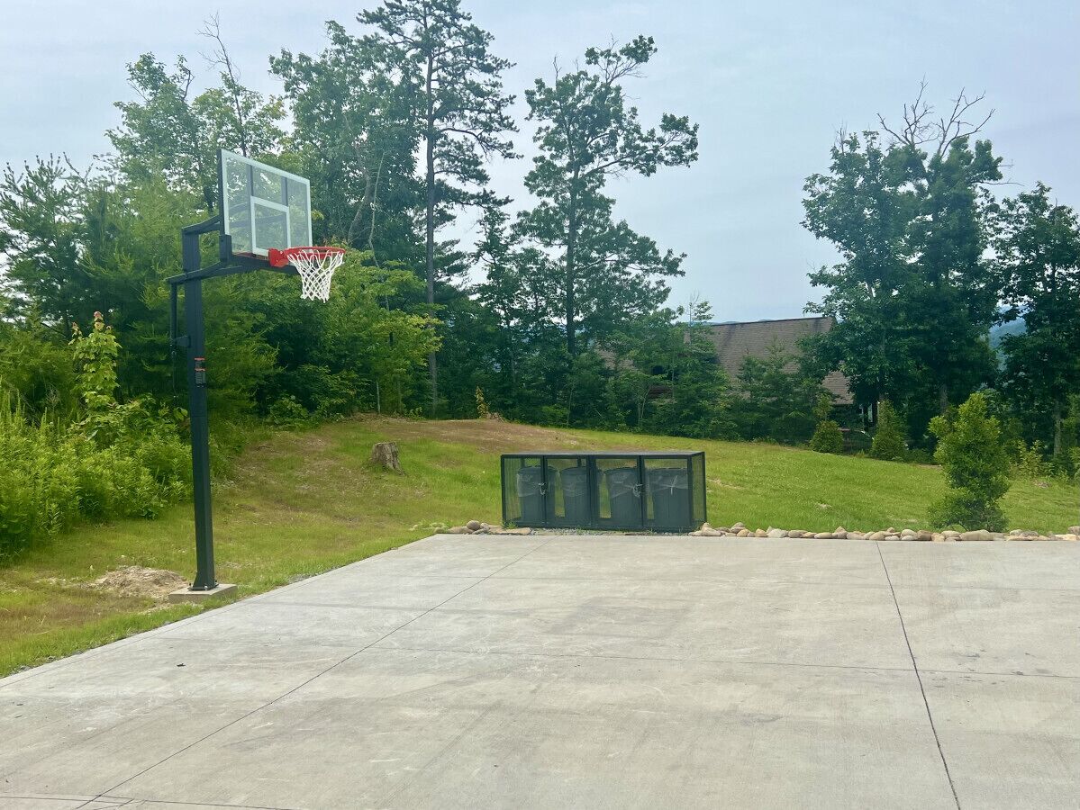 If you prefer outdoor games, shoot some hoops with your guests on the adjustable in-ground basketball hoop.