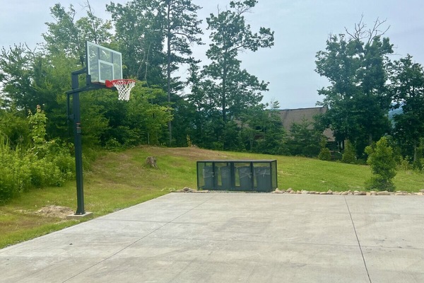 If you prefer outdoor games, shoot some hoops with your guests on the adjustable in-ground basketball hoop.