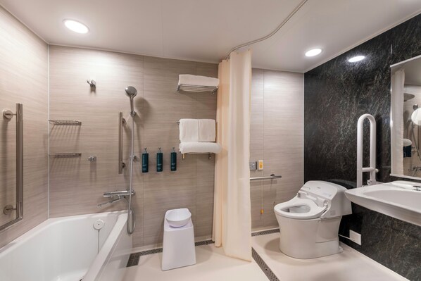 A modern bathroom with a bathtub, toilet, and shower. - Hotel Senren Kyoto Higashiyama Kiyomizu (Kyoto)