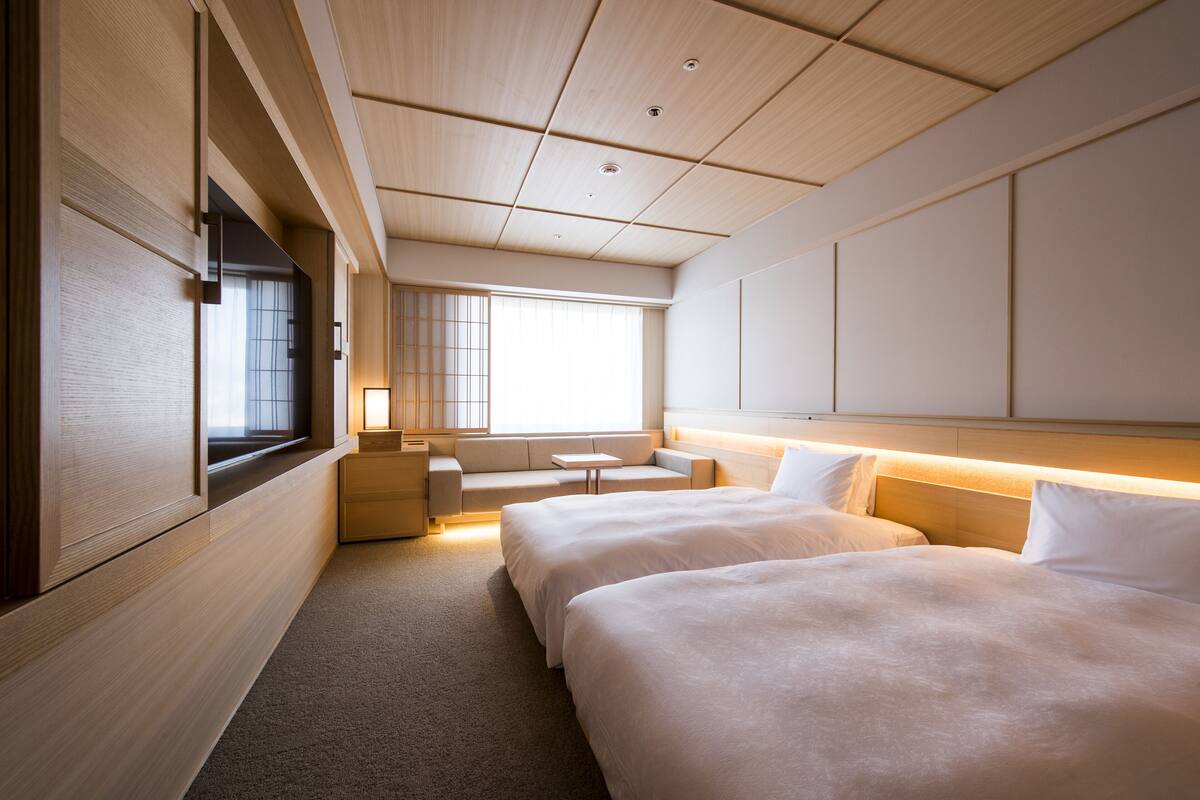 Deluxe-Zweibettzimmer, Nichtraucher | Zimmersafe, Bügeleisen/Bügelbrett, kostenloses WLAN, Bettwäsche