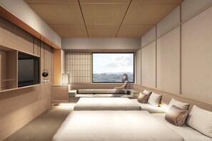 Een kluis op de kamer, een strijkplank/strijkijzer, gratis wifi