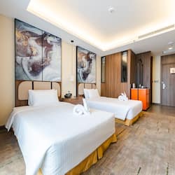 Deluxe Double Room, Multiple Beds, City View | 1 bedroom, minibar, in-room safe, desk