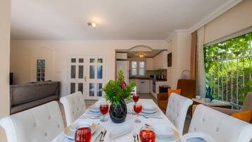 Deluxe Villa | Living area | LCD TV, fireplace
