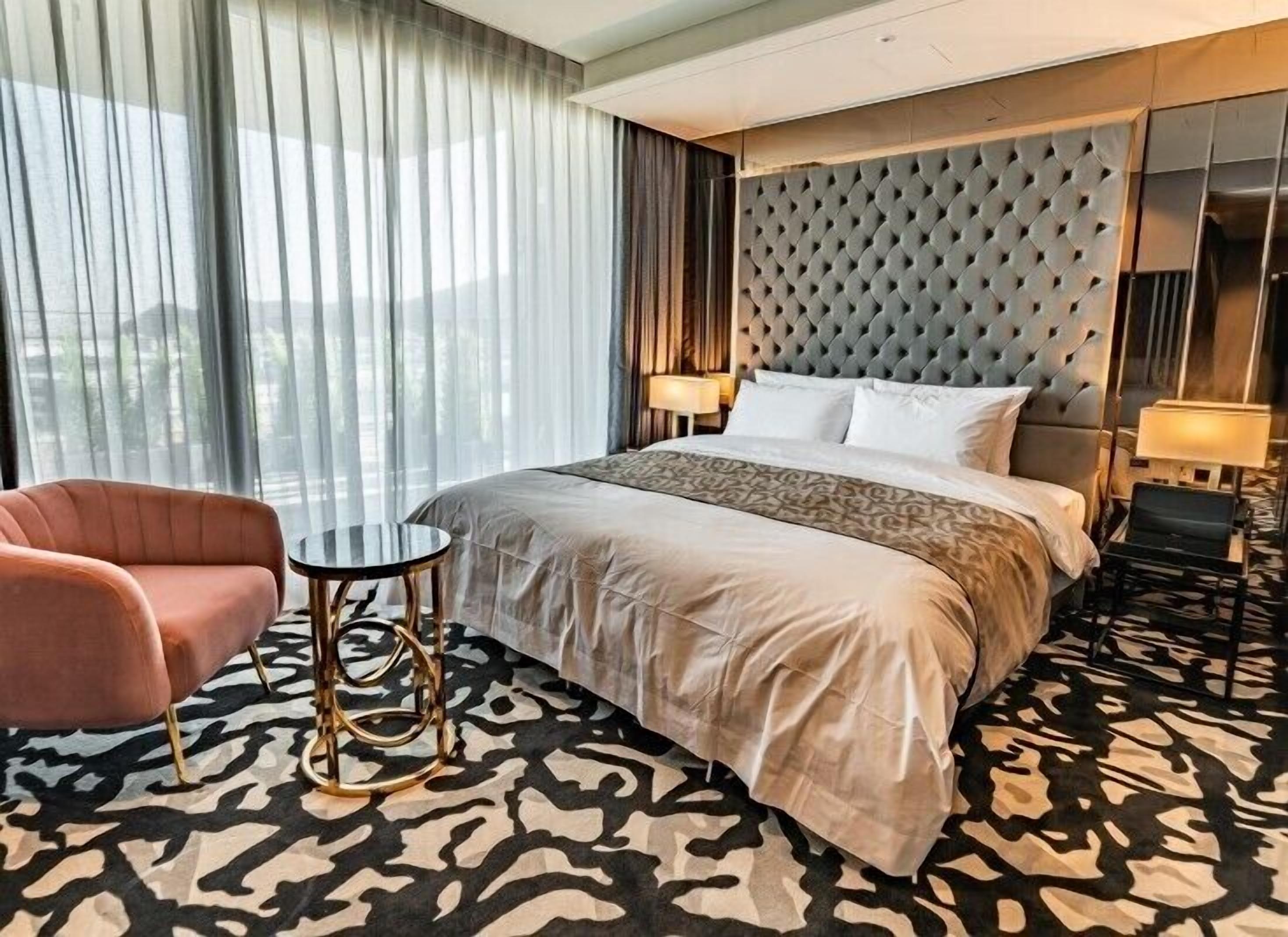 1 bedroom, premium bedding, memory-foam beds, blackout curtains