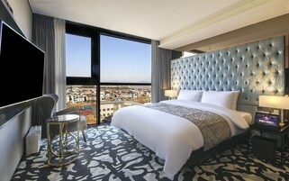 Premium bedding, memory-foam beds, blackout curtains, free WiFi