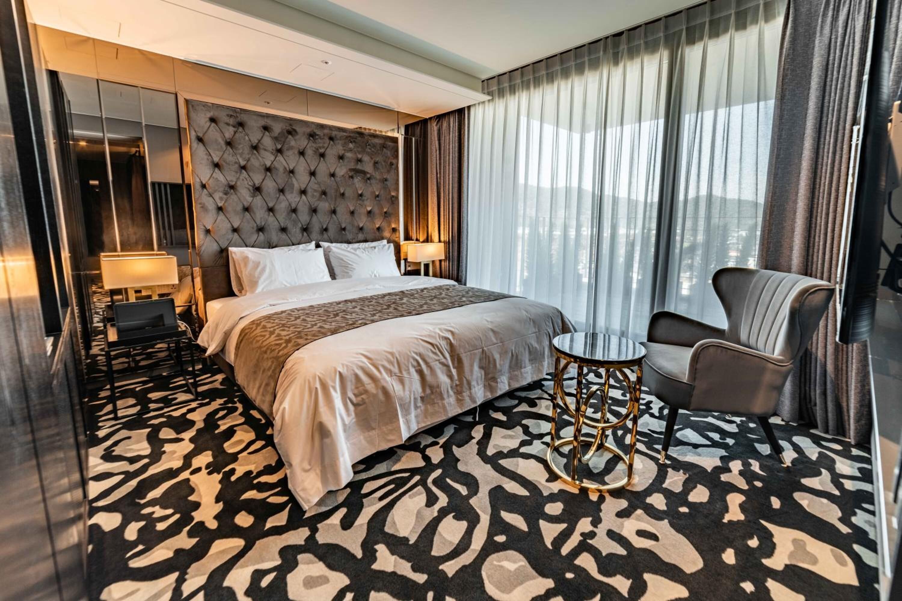 1 bedroom, premium bedding, memory-foam beds, blackout curtains