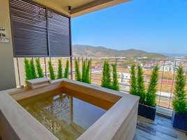 Premium bedding, memory-foam beds, blackout curtains, free WiFi