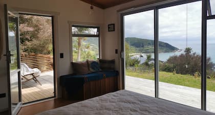 Stunning Eco Cabin with views of full stretch of 90 Mile Beach and Ahipara