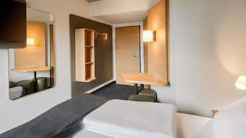 Een bureau, geluiddichte muren, gratis wifi, beddengoed