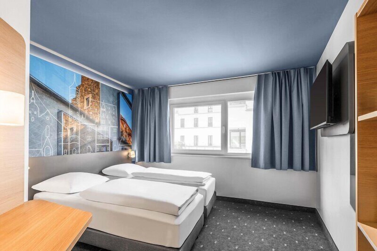 Doppel- oder Zweibettzimmer