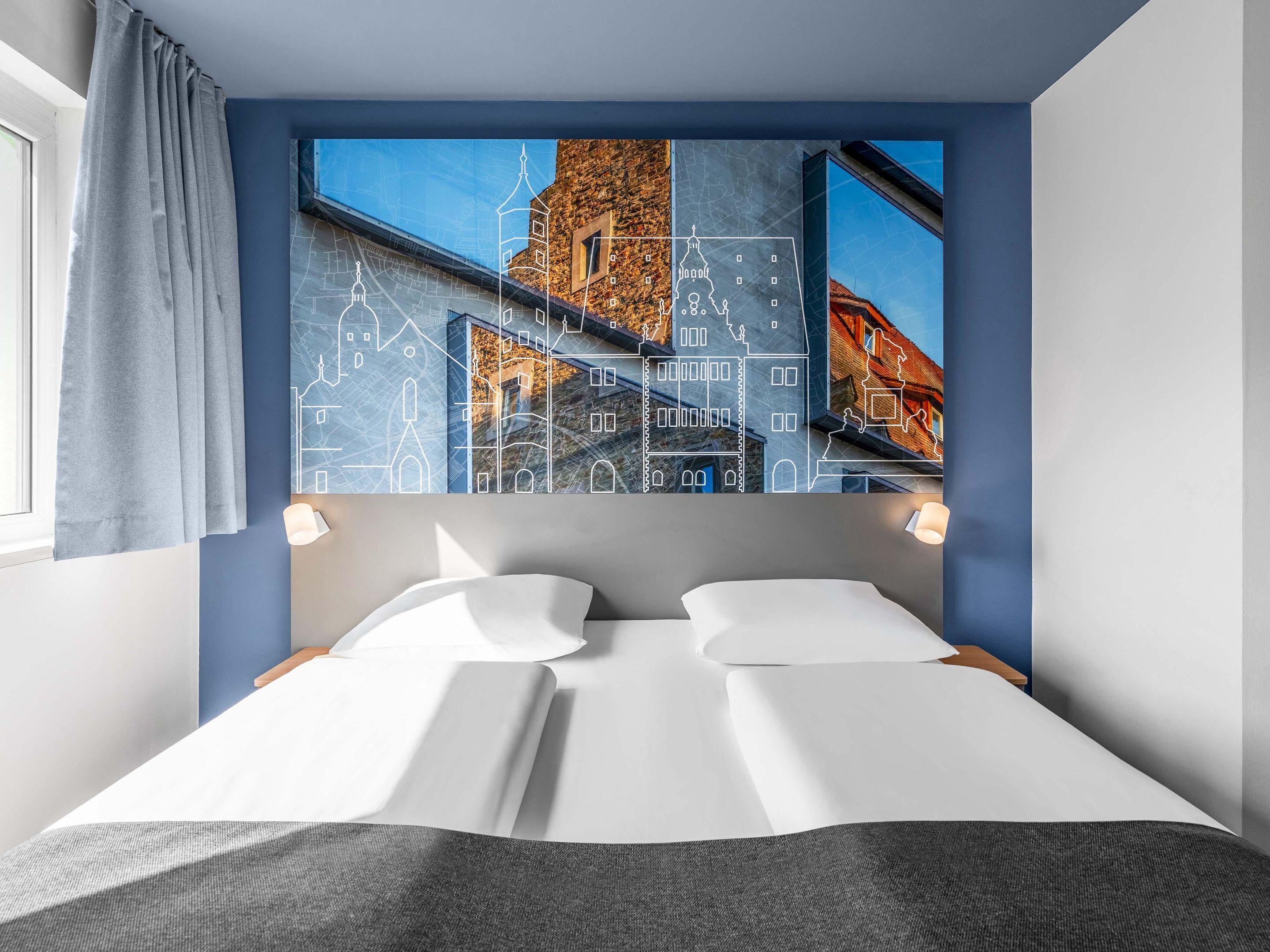 Tweepersoonskamer | Een bureau, geluiddichte muren, gratis wifi, beddengoed