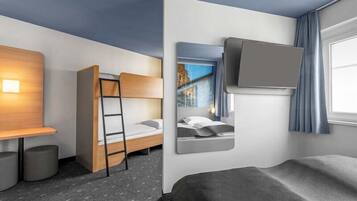 Habitación cuádruple | Escritorio, insonorización, wifi gratis y ropa de cama