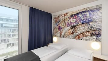 Habitación con 1 cama doble o 2 individuales | Escritorio, sistema de insonorización, wifi gratis y ropa de cama