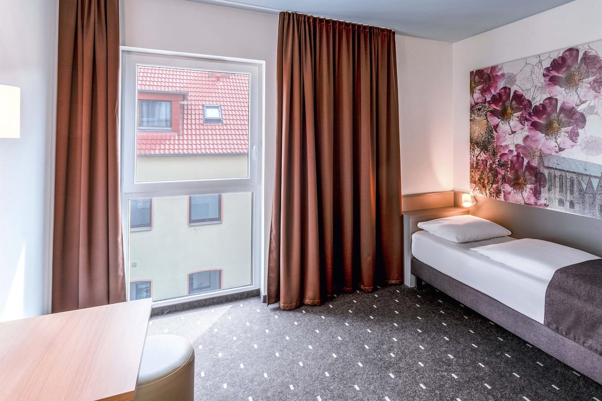 Einzelzimmer | Schallisolierte Zimmer, kostenloses WLAN, BettwÀsche