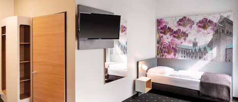 Quartos à prova de som, Wi-Fi de cortesia, roupa de cama