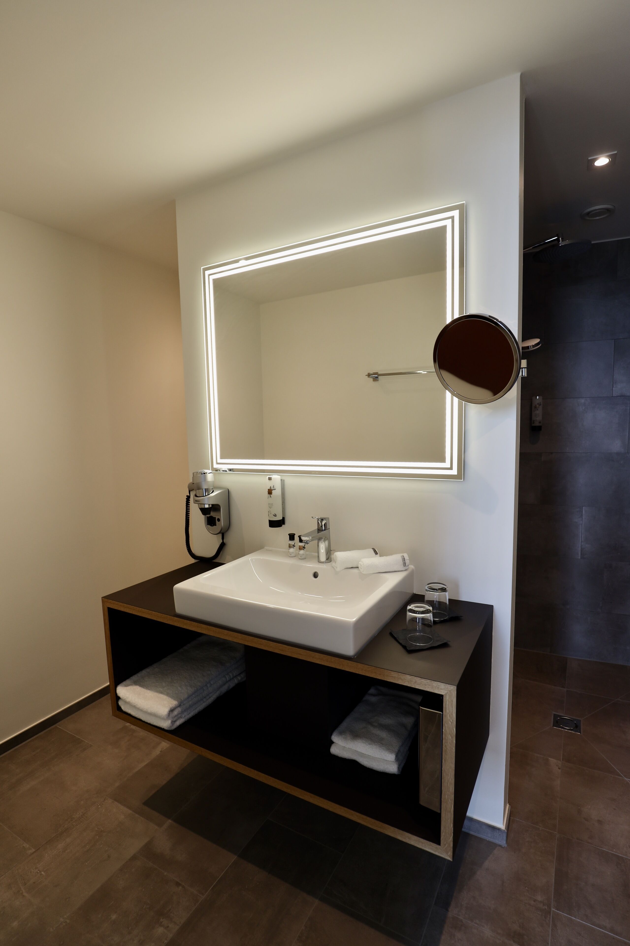 shower, rainfall showerhead, hair dryer, slippers