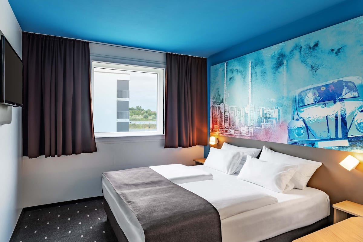 Habitación doble | Escritorio, espacio para trabajar con laptop y insonorización