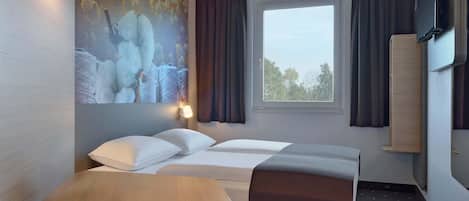 Habitación doble | Escritorio, sistema de insonorización, wifi gratis y ropa de cama