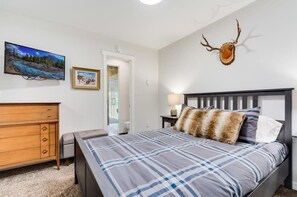 1 bedroom, desk, iron/ironing board, travel crib