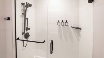 A glass-enclosed shower area with a handheld showerhead, a handheld showerhead, a handheld showerhead, a handheld showerhead, a handheld showerhead, a handheld showerhead, a handheld showerhead, a handheld showerhead, a handheld showerhead, a handheld showerhead, a handheld showerhead, a handheld showerhead, a handheld showerhead, a handheld showerhead, a handheld showerhead, a handheld showerhead, a handheld showerhead, a handheld showerhead, a handheld showerhead, a handheld showerhead, a handheld showerhead, a handheld showerhead, a handheld showerhead, a handheld showerhead, a handheld showerhead, a handheld showerhead, a handheld showerhead, a handheld showerhead, a handheld showerhead, a handheld showerhead, a handheld showerhead, a handheld showerhead, a handheld showerhead, a handheld showerhead, a handheld showerhead, a handheld showerhead, a handheld showerhead, a handheld showerhead,