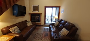 Smart TV, fireplace, DVD player, books