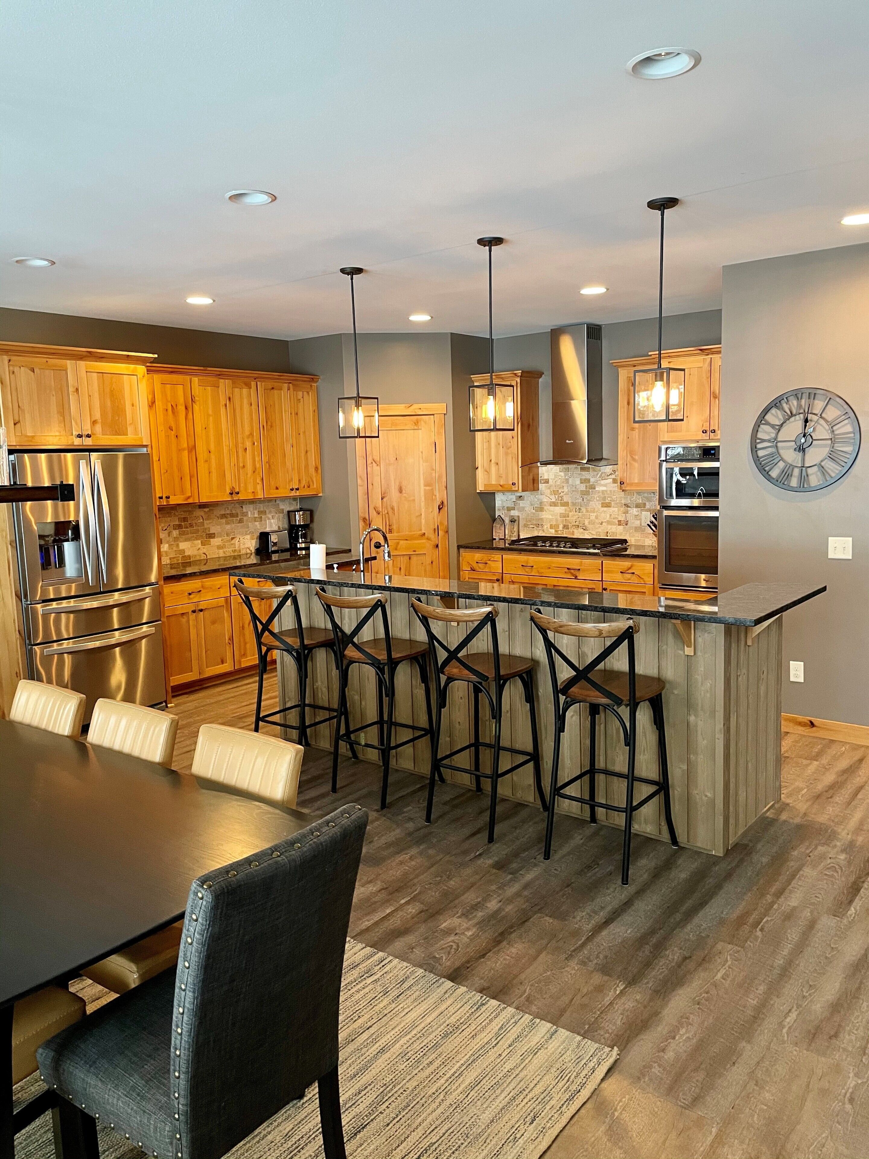 NEWLY BUILT, MODERN HOME on the WHITE FISH CHAIN! Sandy beach with Sunset View