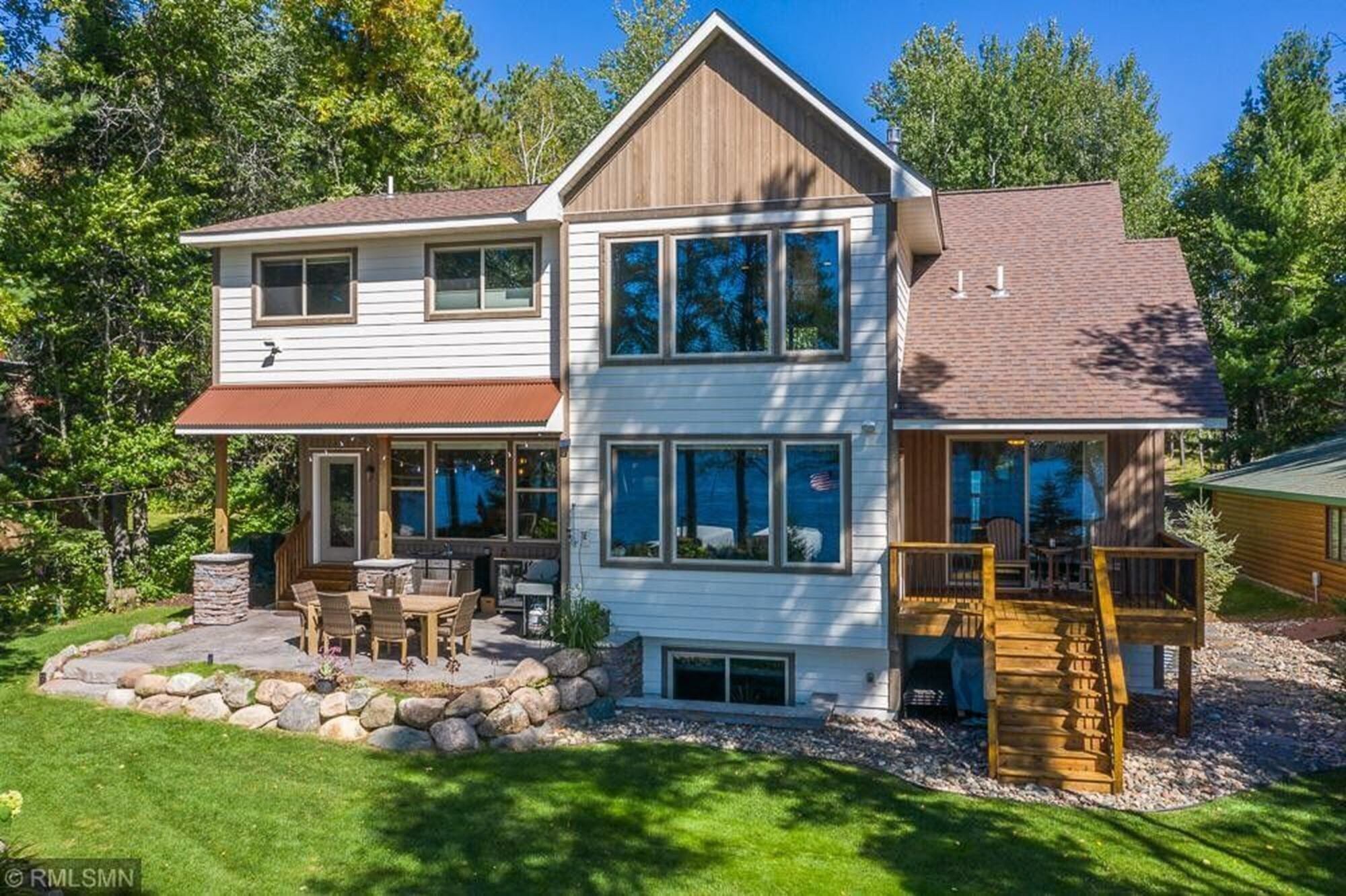 NEWLY BUILT, MODERN HOME on the WHITE FISH CHAIN! Sandy beach with Sunset View