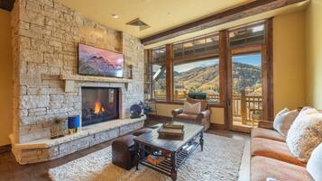 Condo Premier | Sala de estar | Televisión de 50 pulgadas con canales por cable y Netflix