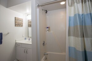 Bathtub, hair dryer, towels