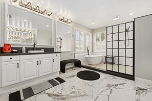Combined shower/tub, hair dryer, towels, soap