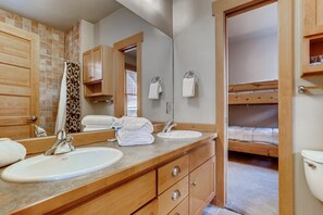 Combined shower/bathtub, hair dryer, towels, soap