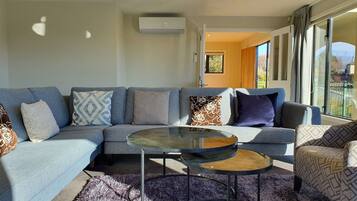 House | Living room | 50-inch Smart TV with digital channels, TV