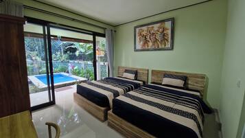 Family Villa, 2 Bedrooms, Garden View | In-room safe, individually decorated, individually furnished, desk