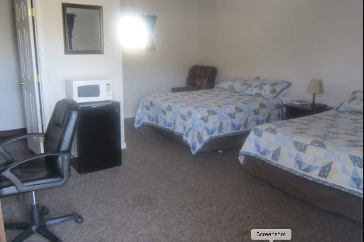Individually furnished, desk, laptop workspace, iron/ironing board